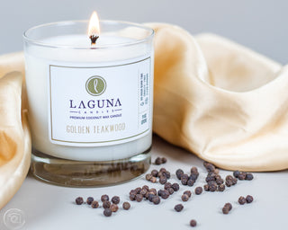 Elevate your ambiance with Laguna Candles Golden Teakwood 11oz Classic Candle