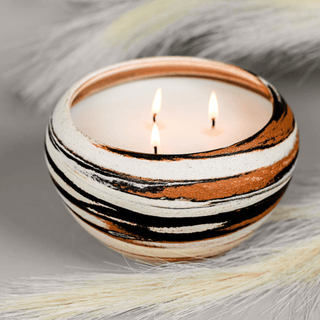 Luxurious Ceramic Candle in a blend of rich brown, tan, black, and white by Laguna Candles