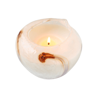 A beautiful scented white hand-blown glass artisan candle from Laguna Candles
